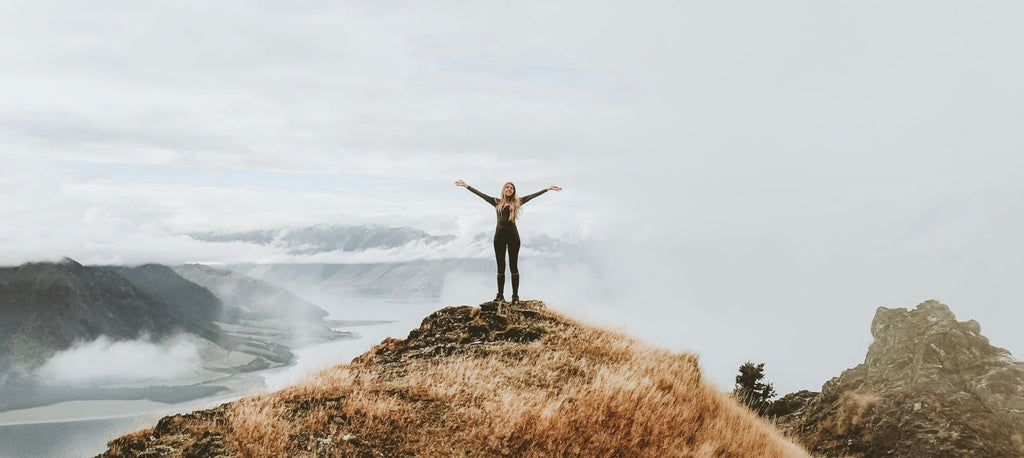 Girl on top of a hill