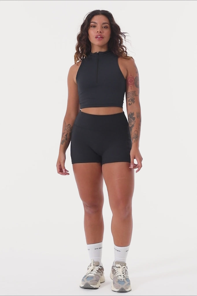Cute black shorts: mid-high waisted with side pockets, V-shaped back seam, squat proof, no front seam, and double-layered waistband.