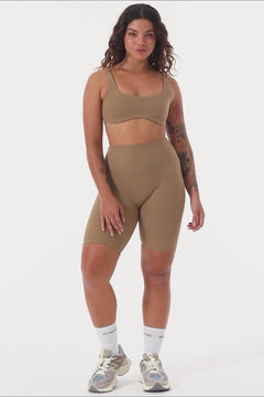 Mid-high waisted Light brown shorts with a V-shaped back seam for a flattering lift. Squat proof, no front seam, and double-layered waistband