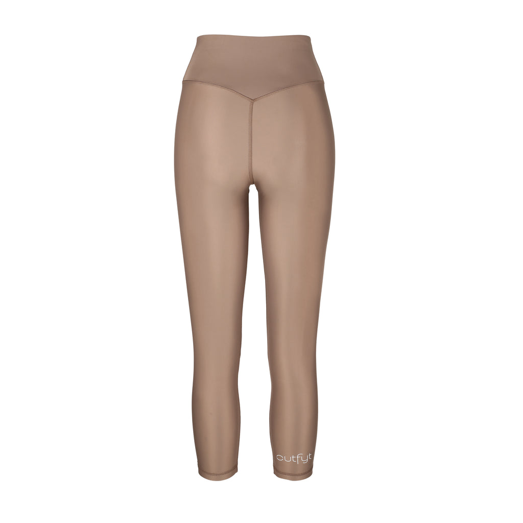 Versatile sand  colour 7/8 compressive leggings that fit like a glove and stay put during workouts. Squat proof and no front seam for ultimate comfort, ghost image back view