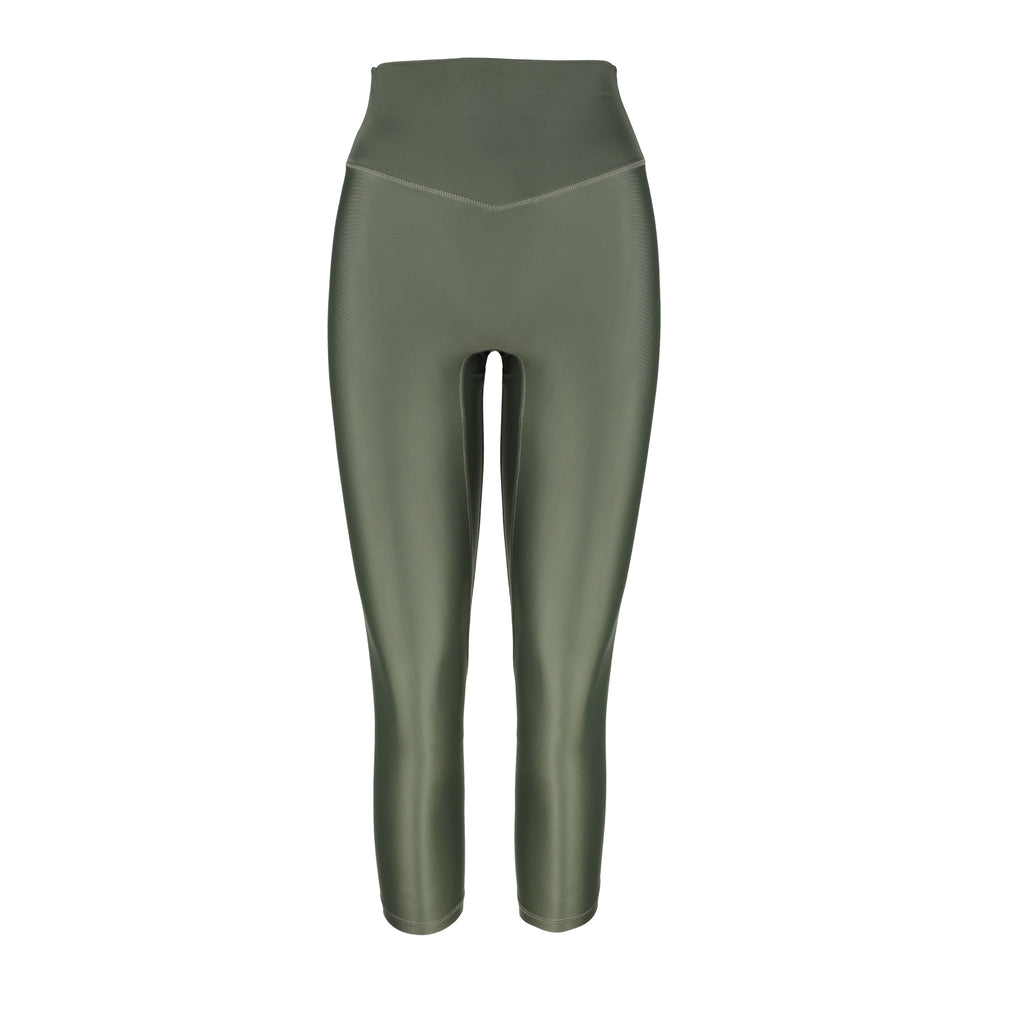 Versatile olive green 7/8 compressive leggings that fit like a glove and stay put during workouts. Squat proof and no front seam for ultimate comfort, ghost image front view