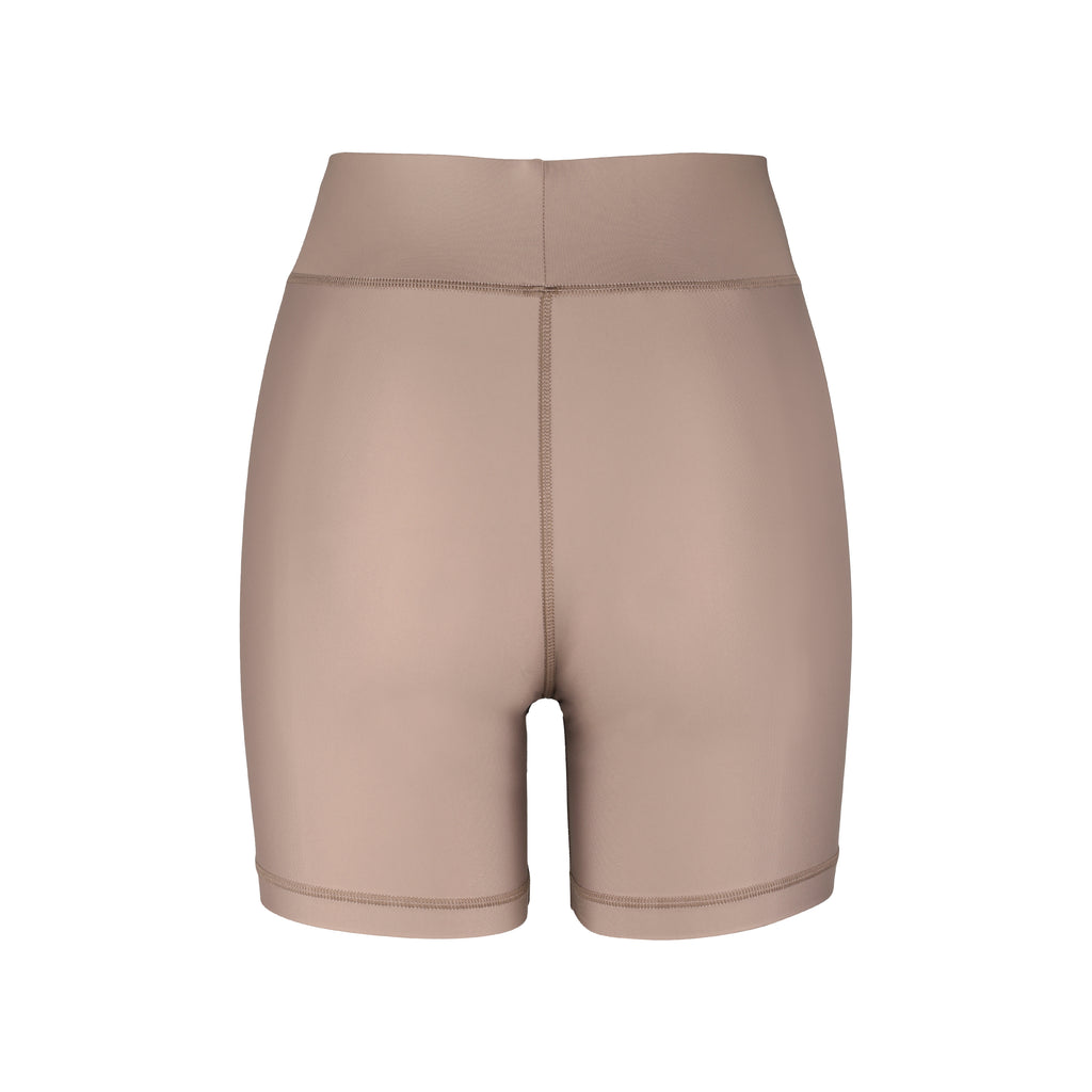 High-waisted beige bicycle shorts with a secure, compressive fit. No front seam and flattering wide waist band, ghost image back view