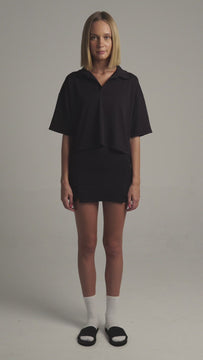Black Boxy Polo Shirt with lightweight, airy sleeves for free movement 