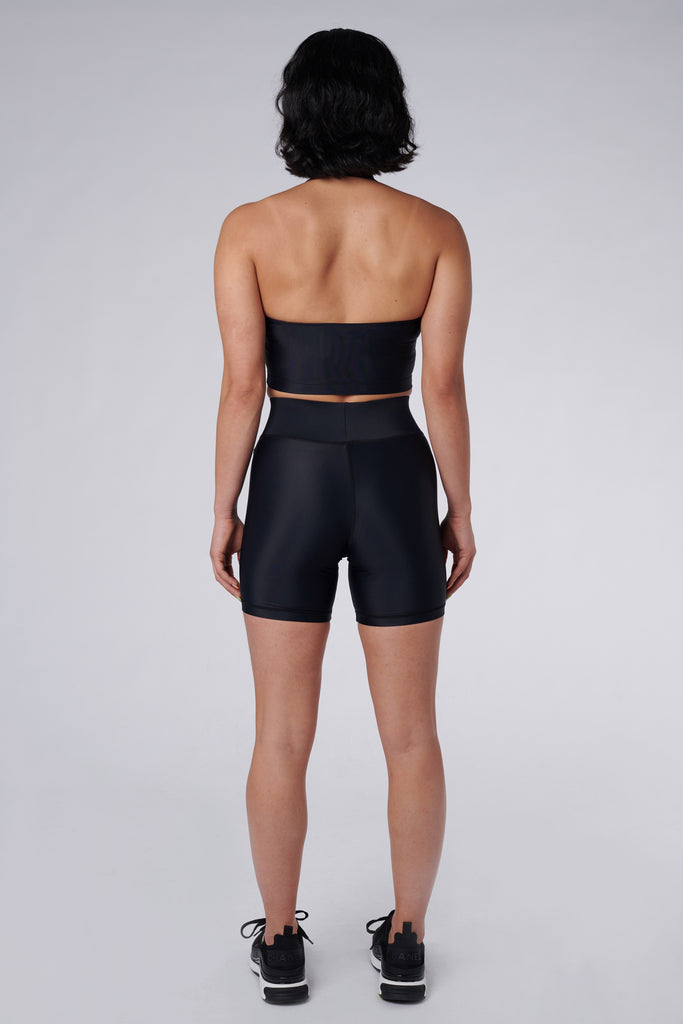 Back view of model wearing Cora Bicycle Shorts in Black