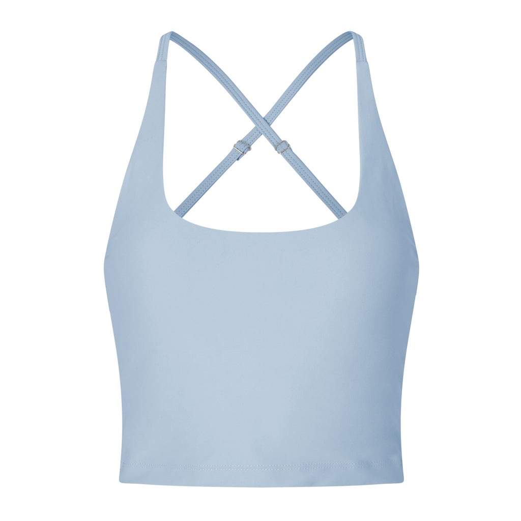 Light blue seamless crop top with cross back adjustable straps, in-built sports bra, and removable padding , ghost image front view