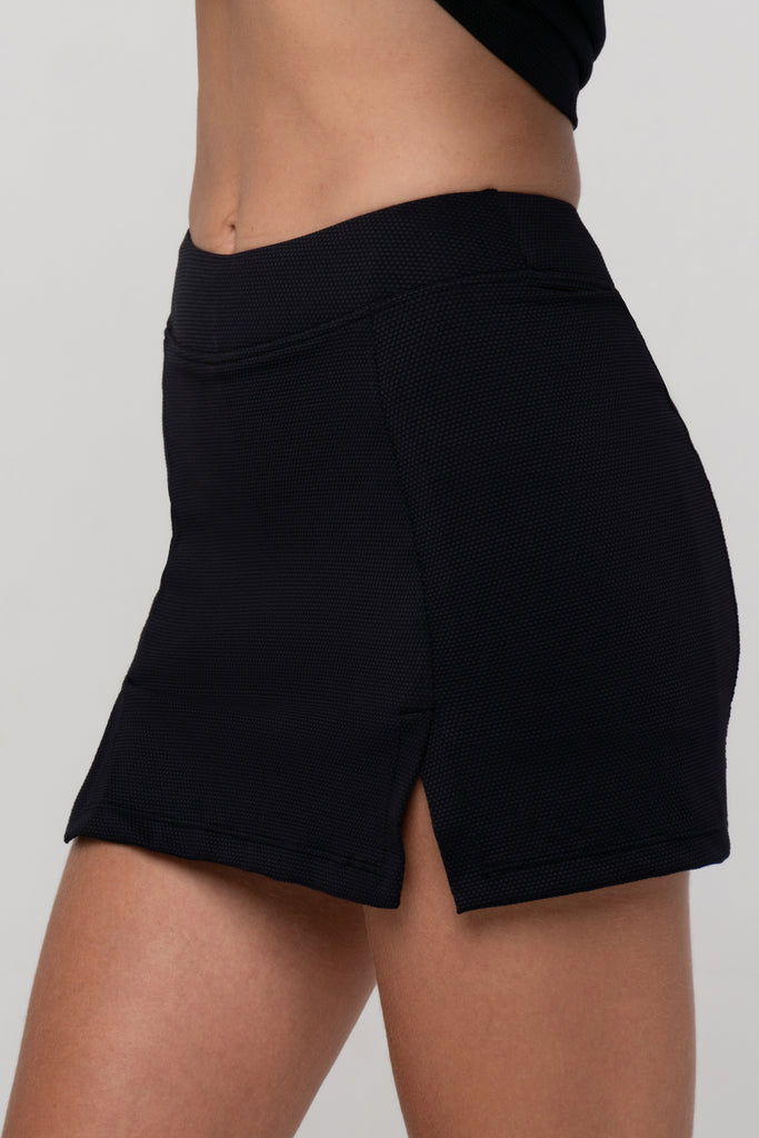 Breathable soft black stretchy fabric with built-in shorts with side pockets. Lightweight perfect fit with no ride-ups for  ultimate comfort.