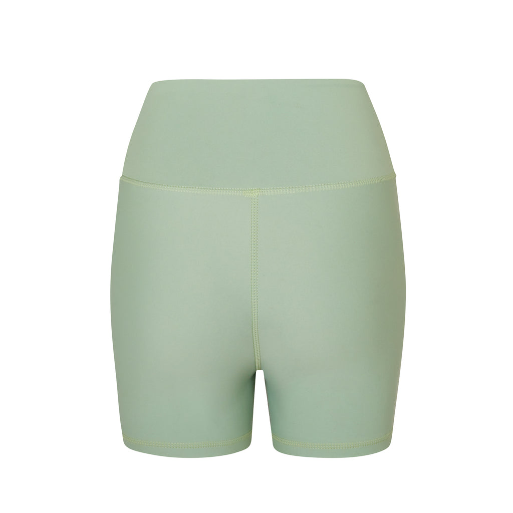 Light green high-waisted shorts with a double-layered waistband that lies flat. No front seam for ultimate comfort and no camel toe, ghost image back view