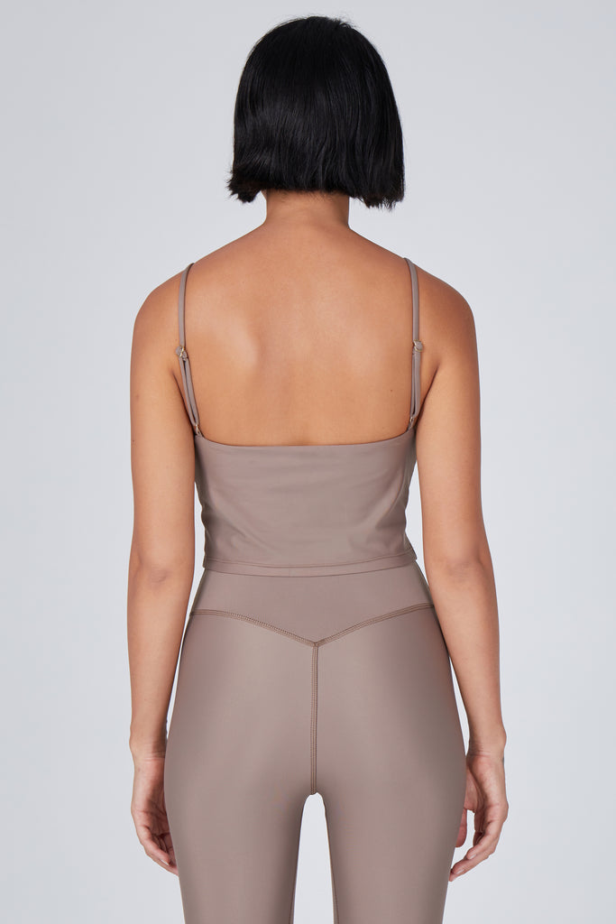 Sand coloured crop top with inbuilt bra for low-impact activities, seamless fit, removable padding, and adjustable straps. Comfortable for work or on the go, back view