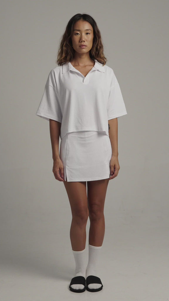 White Boxy Polo Shirt with lightweight, airy sleeves for free movement 