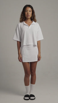 White Boxy Polo Shirt with lightweight, airy sleeves for free movement 